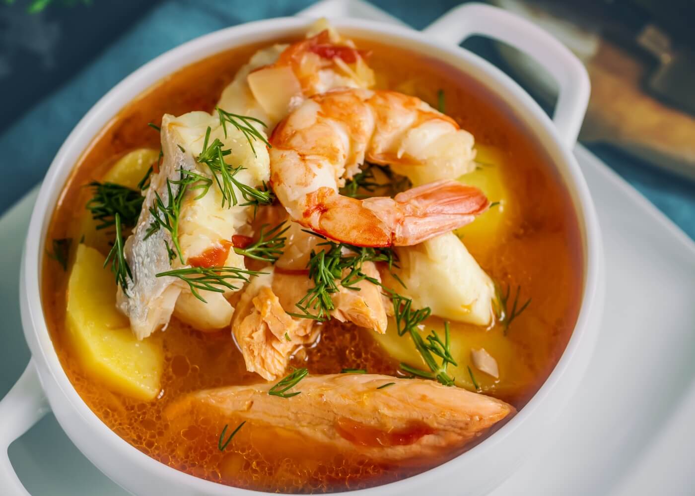 Caldeirada is a Portuguese fish stew made with wide variety of fish and potatoes, along with other ingredients.
