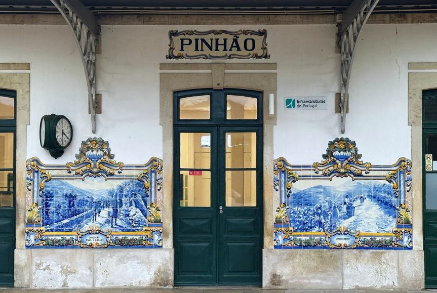 The iconic blue-tiled train station in Pinhão, one of the best day trips from Porto